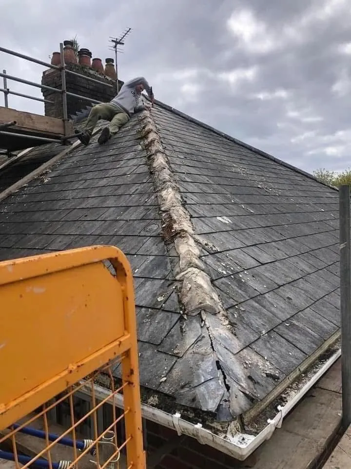 Slate roof ridge and chimney repair in Polzeath